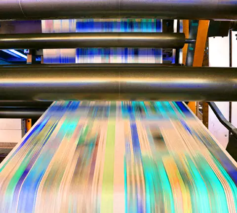 roll offset print machine in a large print shop for production of newspapers & magazines